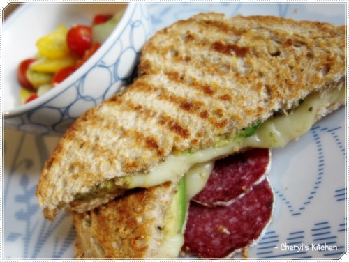 Tomato cucumber salad, cheese panini and of course couple slices of salami. :)