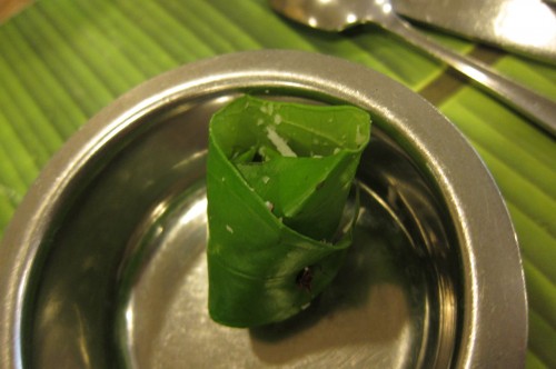 South Indian Paan (betel leaf filled with grated coconut and sugar  - chewed as a palate cleanser, a breath freshener, and for digestive purposes)