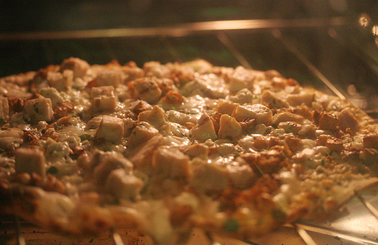 Garlic Chicken Pizza in the Oven... hmm... smells so good